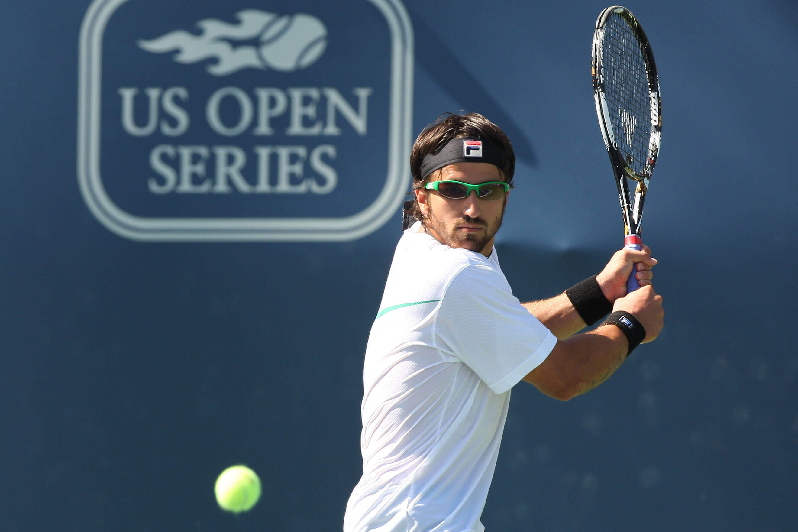 Professional tennis player wearing sunglasses